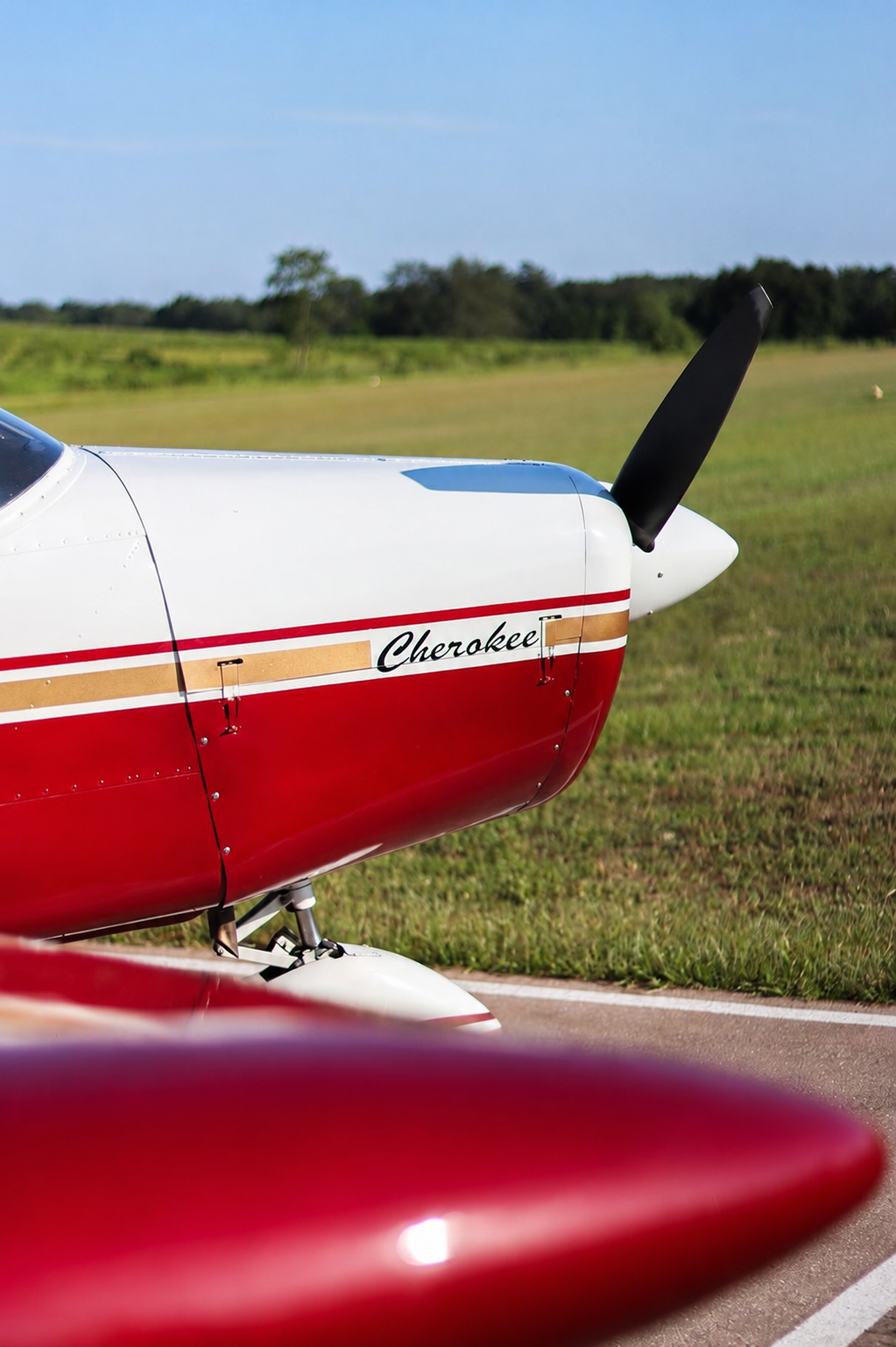 Piper Cherokee on the flight line at Mason Aviation